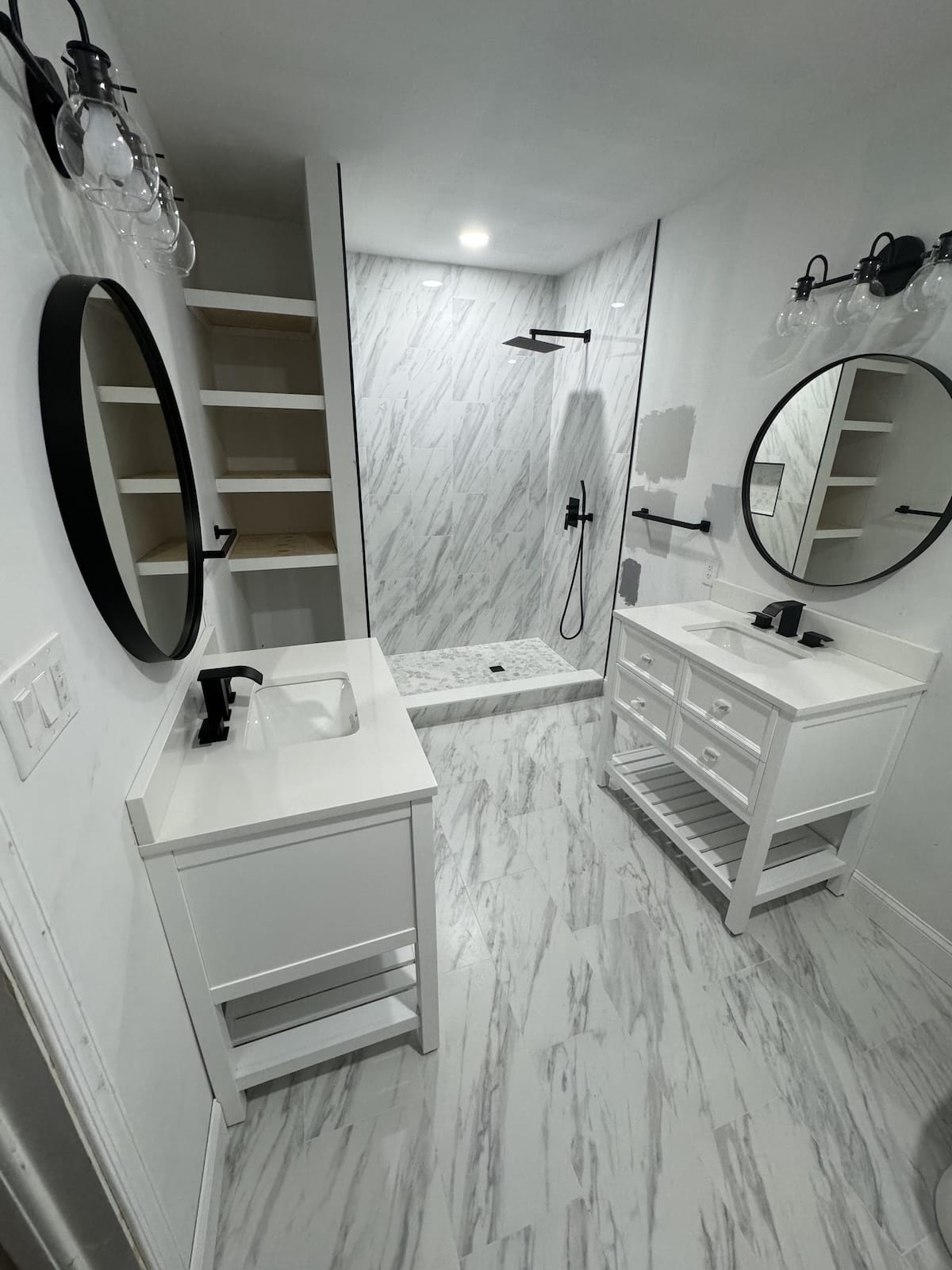 Bathroom remodel with a freestanding tub and tiled shower
